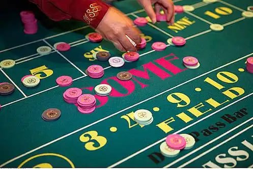 Tampilan permainan Big Bass Bonanza di aplikasi nagason dengan fitur bonus dan simbol pembayaran